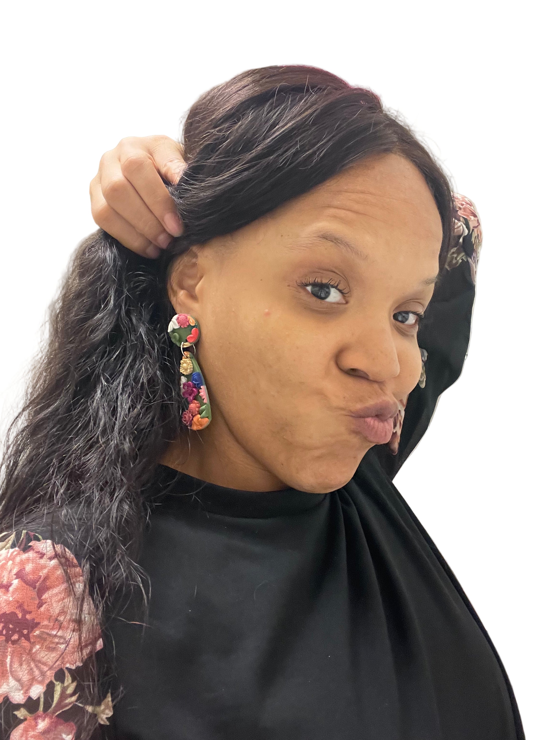 Corparate woman wearing a black outfit with floral handmade earrings -Juniperzcreations NYC Bold Afro- feminine jewelry